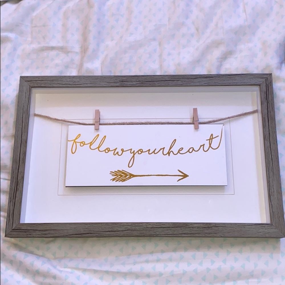 “Follow your heart” Sign